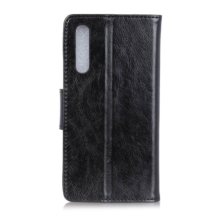 Black textured leather flip phone case back with cutout for camera and flash