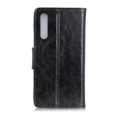 Black textured leather flip phone case back with cutout for camera and flash