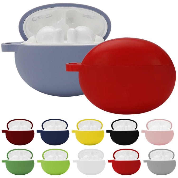 Set of colored silicone earbud case storage boxes, shown with lids and white earbuds.