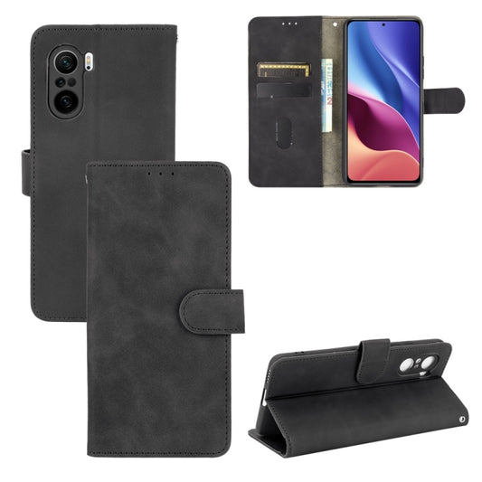 Black PU leather wallet case with magnetic buckle, card slots, and flip cover