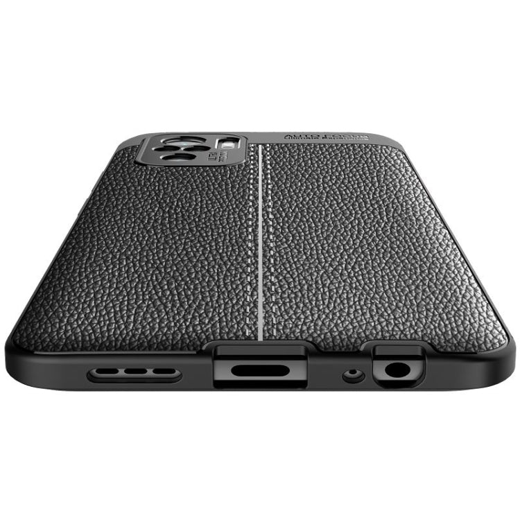 Black TPU case bottom view with cutouts for ports and speaker, raised shockproof corners