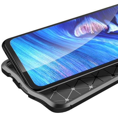 Black TPU case with textured back and front lip to help protect the phone screen