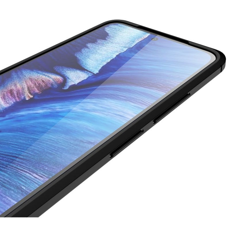 Angled view of black TPU case with textured surface and raised screen-protecting front rim