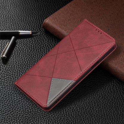 Red rhombus-pattern leather flip phone case with stitched edges and card window
