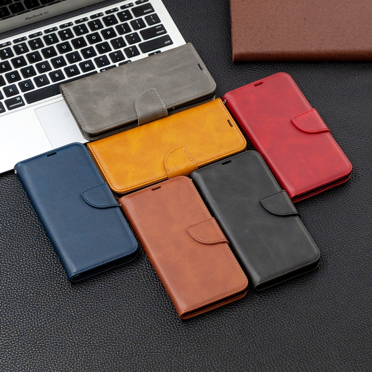 Assorted PU leather flip phone cases with card slots in blue, tan, red, and black