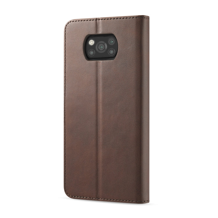 Brown leather phone case with camera cutout and slim folio back