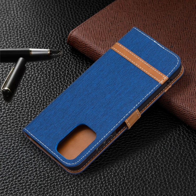 Blue denim-texture leather wallet phone case with lanyard ring and tan stitched strap