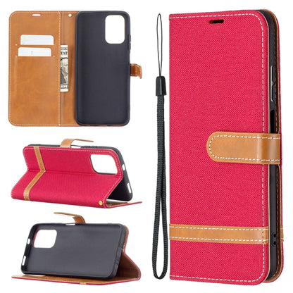 Red denim-texture leather wallet phone case with tan card holder and lanyard strap