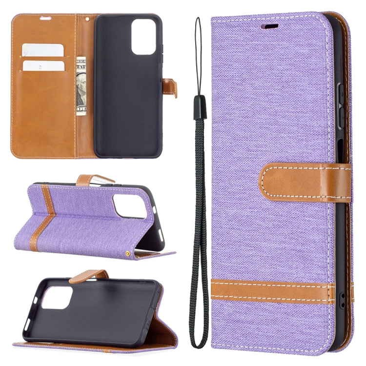 Purple denim-texture leather wallet phone case with tan card holder and lanyard strap