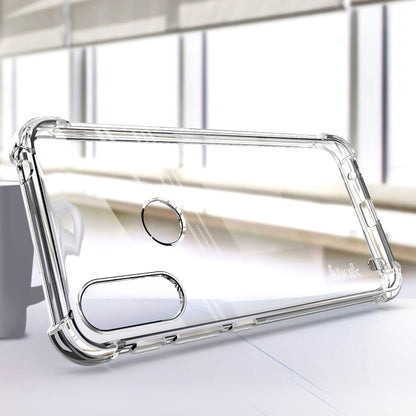 Transparent TPU phone case with circular cutout and protective shock corners