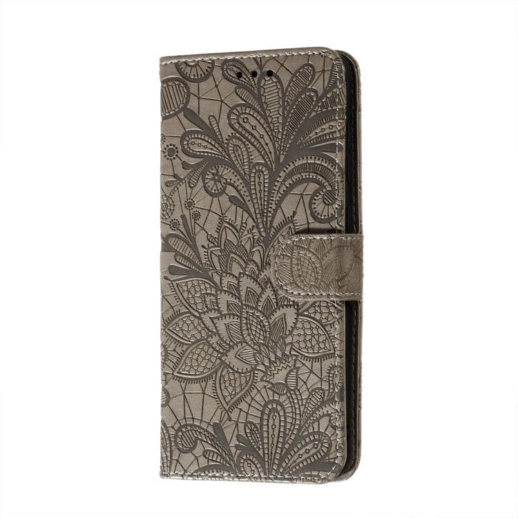 Embossed leather phone wallet case with floral lace pattern and side card slot