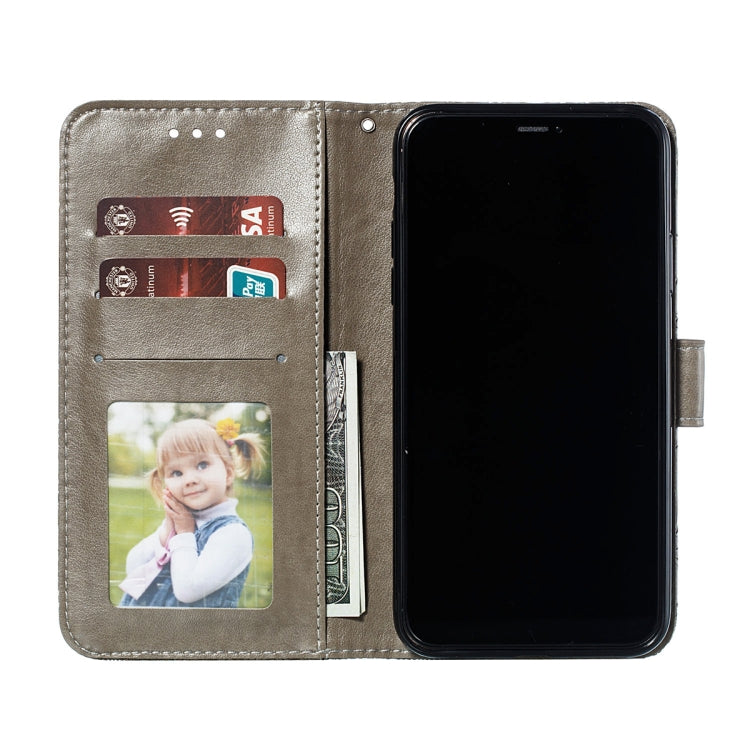 Fold-open leather phone wallet case with card slots and photo window
