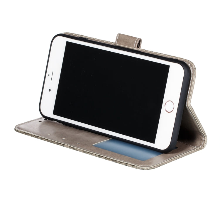Leather phone wallet case with floral lace pattern, phone displayed in landscape stand