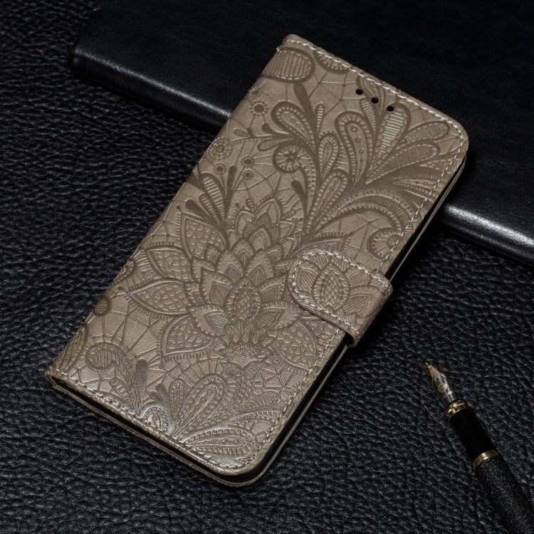 Embossed floral wallet phone case with card slots, light gold folio view
