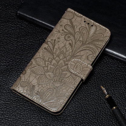 Embossed floral wallet phone case with card slots, light gold folio view