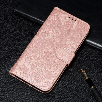 Rose gold faux leather phone wallet case with embossed lace floral pattern and flip cover