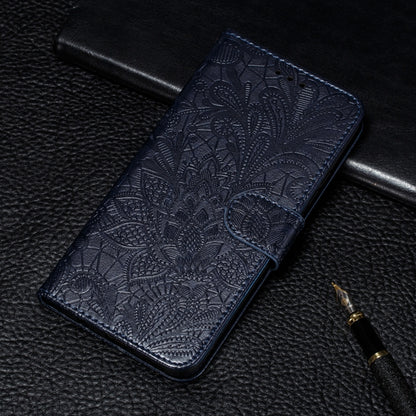 Navy embossed lace-pattern leather flip phone case with card slots and holder