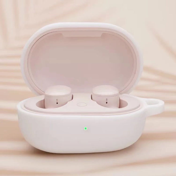 White silicone earphone protective case with open lid and two white earbuds inside
