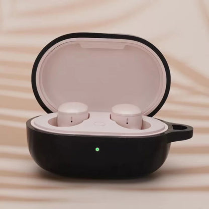 Black silicone earphone protective case with open lid and two white earbuds inside