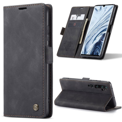 Dark leather flip phone case with card slots and kickstand, showing phone in landscape.