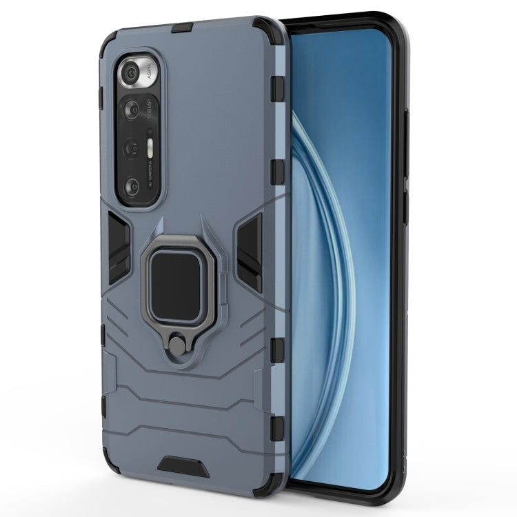 Dark navy shockproof phone case with magnetic ring holder, side button exposed