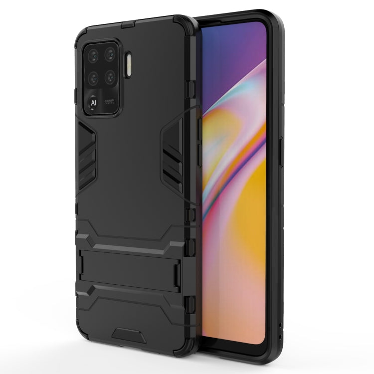 Black shockproof phone case with rugged TPU frame and hidden holder kickstand