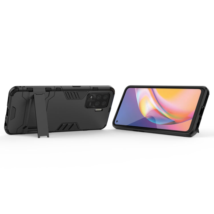 Rugged black phone case with flip-out hidden holder for hands-free viewing