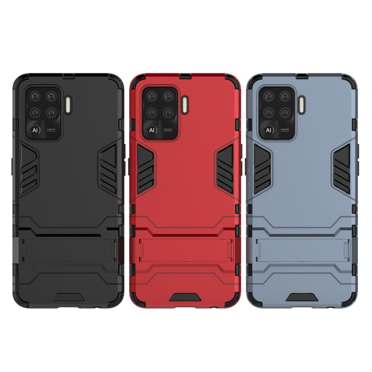 Rugged phone cases in black, red, and navy with TPU bumper and camera cutouts