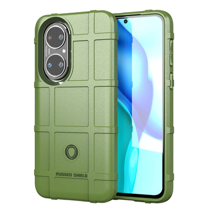 Rugged shockproof TPU phone case, green with grid texture, raised corners, and camera cutouts