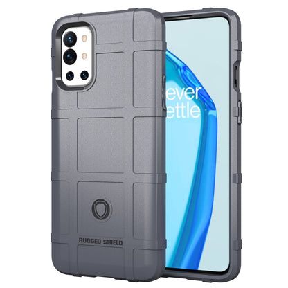 Rugged shockproof TPU phone case, gray with raised grid texture, camera cutouts, and side buttons