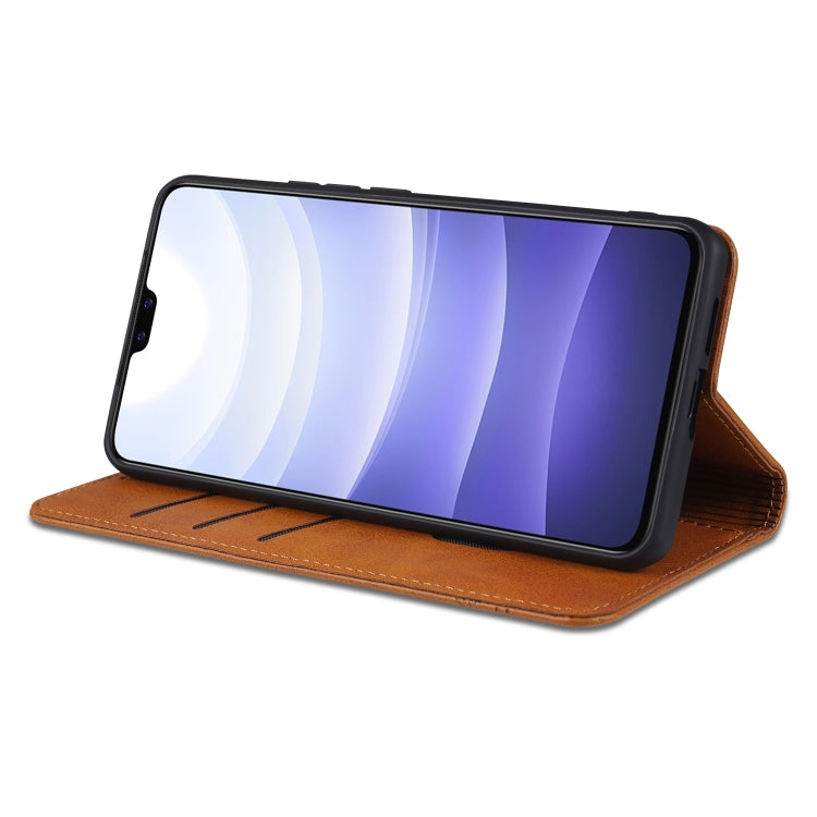 Brown leather flip phone case with stand fold, showing phone screen