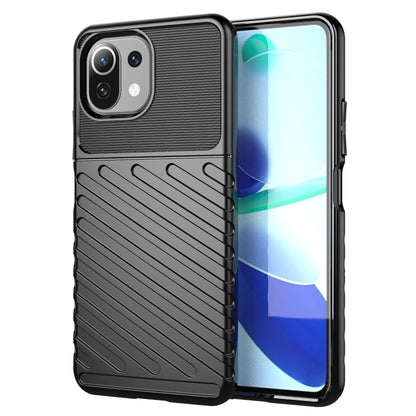Black TPU protective phone case with ribbed grip and raised camera bezel
