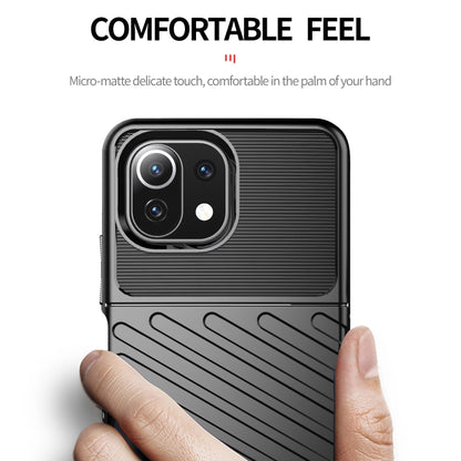 Black ribbed TPU phone case with micro-matte texture and raised camera bezel