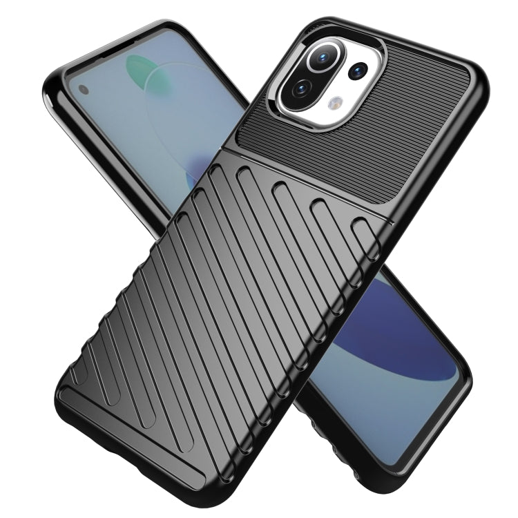 Black ribbed TPU phone case on device, showing camera cutout and protected edges