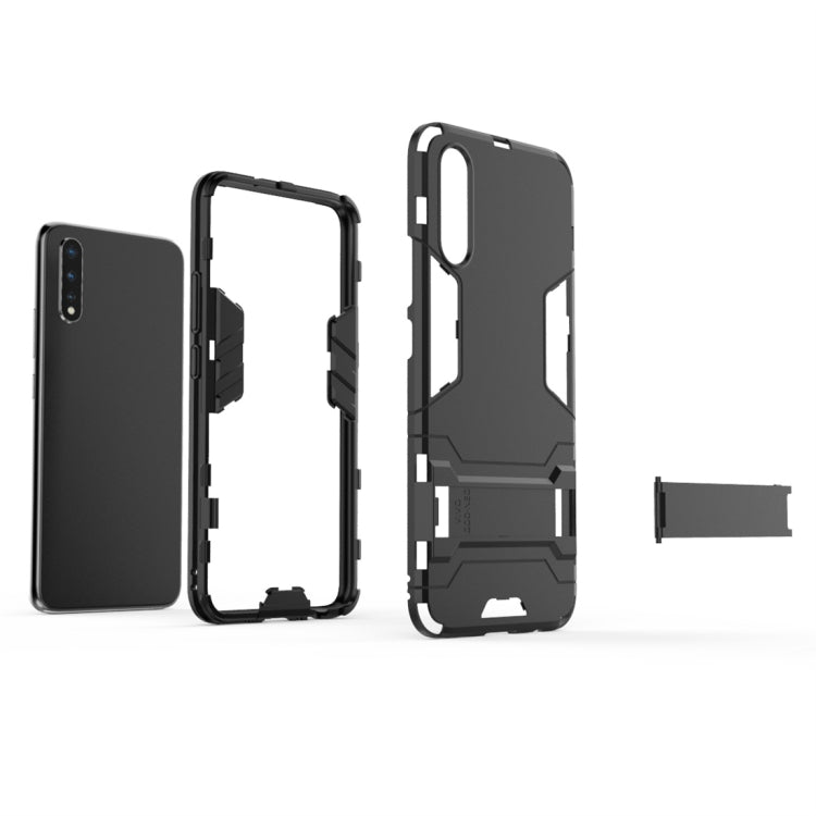 Rugged black shockproof phone case with protective bumper and access cutouts