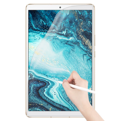 Matte paperfeel tablet screen protector on gold-framed tablet, stylus smooths across film