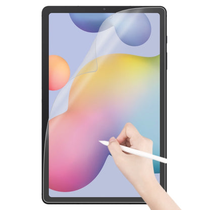 Matte paperfeel screen protector on tablet with hand pressing the film