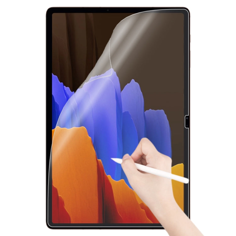 Matte paperfeel tablet screen protector on black-framed tablet, hand applies with stylus