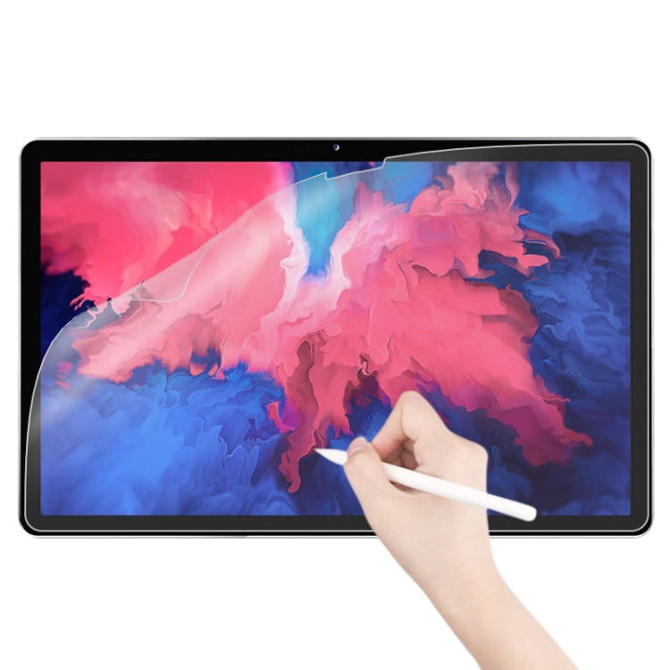 Matte paperfeel tablet screen protector on black-framed tablet, hand smooths with stylus