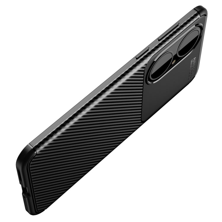 Black TPU phone case with carbon fiber texture, slim profile, and button cutouts