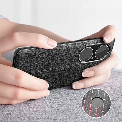 Black textured TPU phone case with dual camera cutout, shown in hand