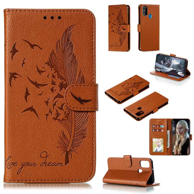Orange flip leather phone case with feather bird pattern, card slots, and stand