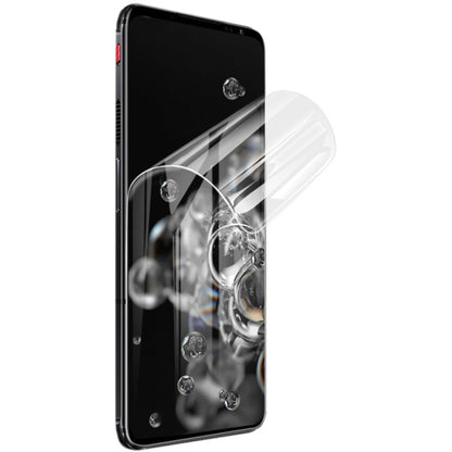 Hydrogel film full-coverage screen protector on smartphone display, clear