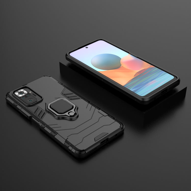 Shockproof TPU phone case with magnetic ring holder; black case with phone inserted