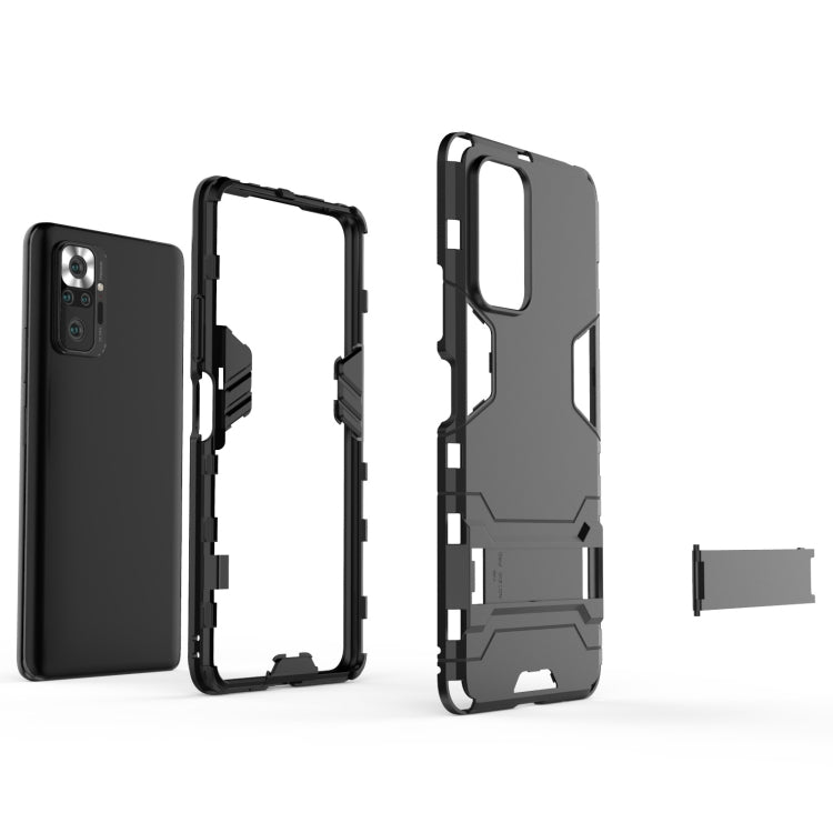 Rugged shockproof phone case in dark gray/black with open-frame cutout design