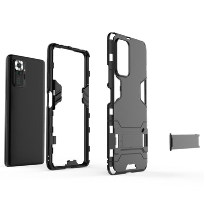 Rugged shockproof phone case in dark gray/black with open-frame cutout design