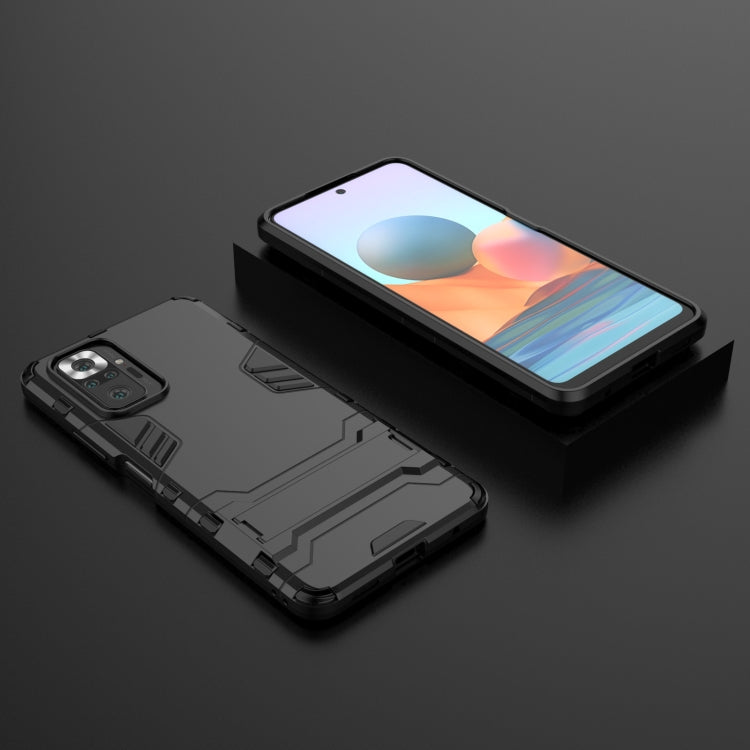 Rugged shockproof phone case in black with camera module cutout and raised corners