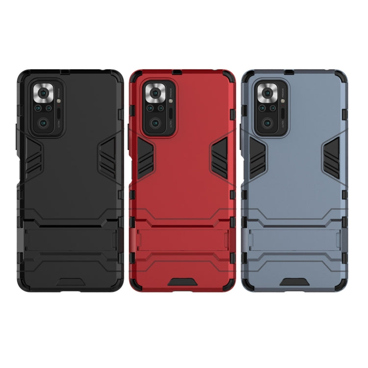 Rugged shockproof phone case set: black, red, and light blue with grip panel design