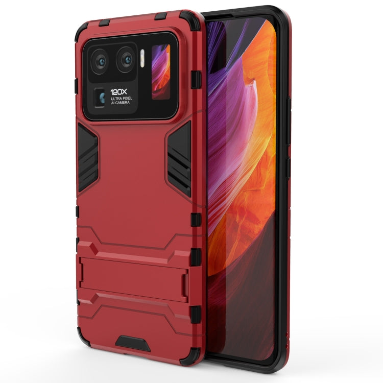 Red rugged shockproof phone case with TPU frame, raised edges and camera cutouts
