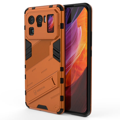 Rugged shockproof phone case, orange with black accents, front and back shown